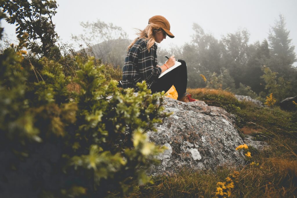 Woman journaling about outgrowing relationships